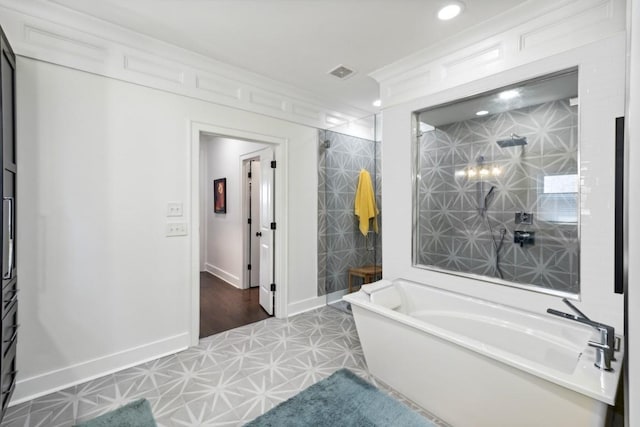 bathroom with shower with separate bathtub