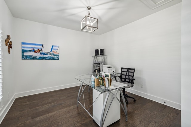 office with dark wood-type flooring and an inviting chandelier