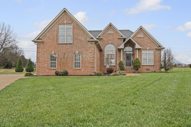 front facade with a front lawn