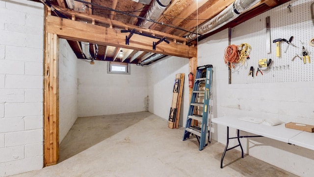 basement with a workshop area