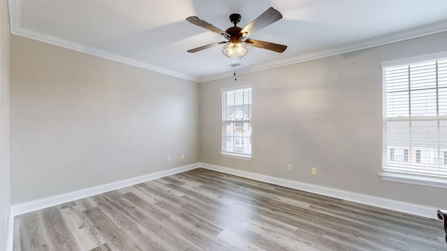 unfurnished room with light hardwood / wood-style flooring, ceiling fan, and ornamental molding