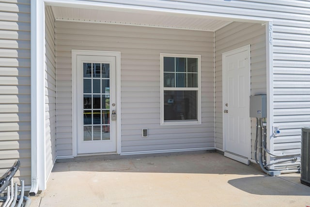 property entrance with a patio area