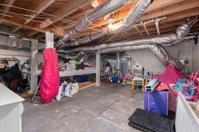 basement featuring water heater