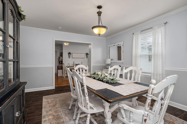 dining area featuring ornamental molding