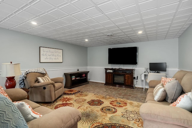 living room featuring a fireplace