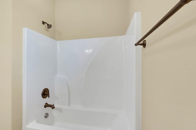 bathroom with shower / bathing tub combination