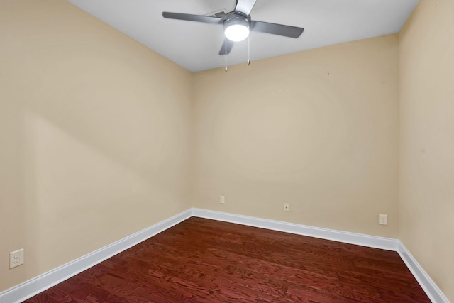 empty room featuring hardwood / wood-style floors and ceiling fan