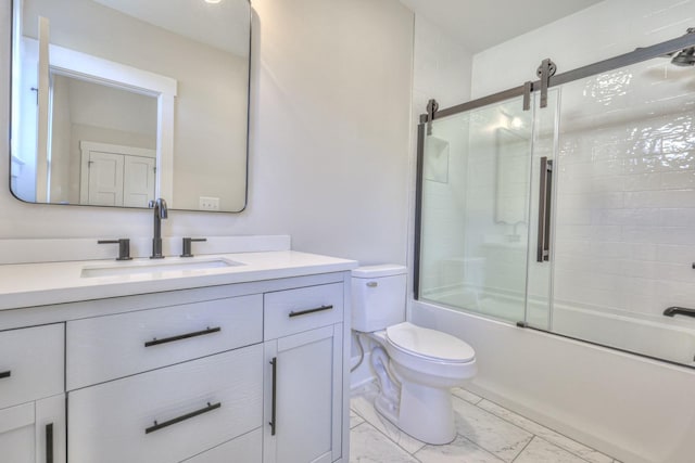 full bathroom featuring toilet, combined bath / shower with glass door, and vanity