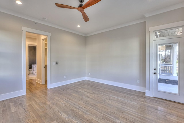 unfurnished room with light hardwood / wood-style flooring, ceiling fan, and ornamental molding