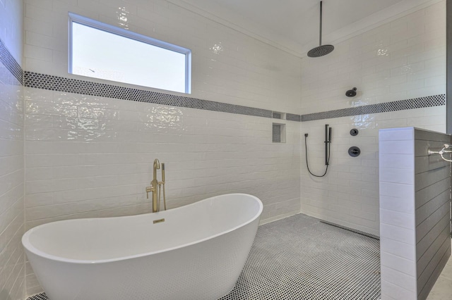 bathroom featuring separate shower and tub and tile walls