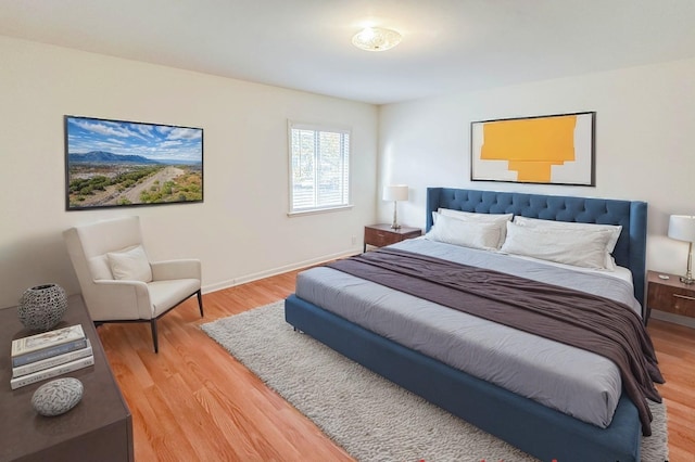 bedroom featuring wood-type flooring