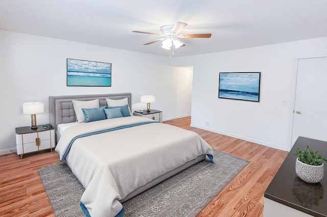 bedroom featuring hardwood / wood-style flooring and ceiling fan