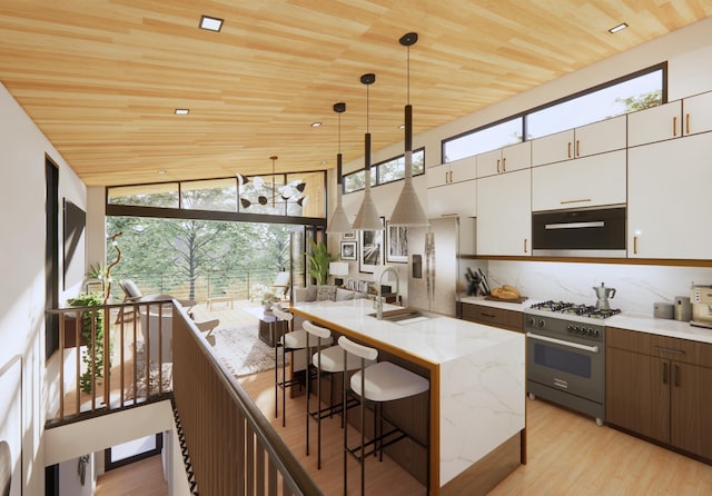 3525 Garner Rd Unit 1, Chattanooga, TN 37406 - kitchen featuring range with gas stovetop, stainless steel fridge, wood ceiling, plenty of natural light, and light stone counters