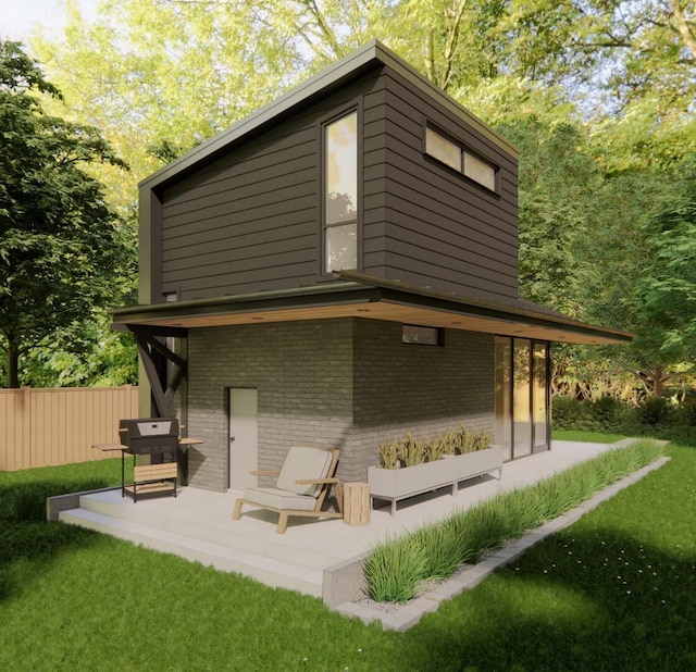 3525 Garner Rd Unit 3, Chattanooga, TN 37406 - rear view of property with brick siding and a patio