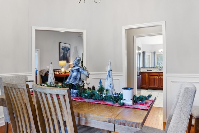 dining room with light hardwood / wood-style flooring