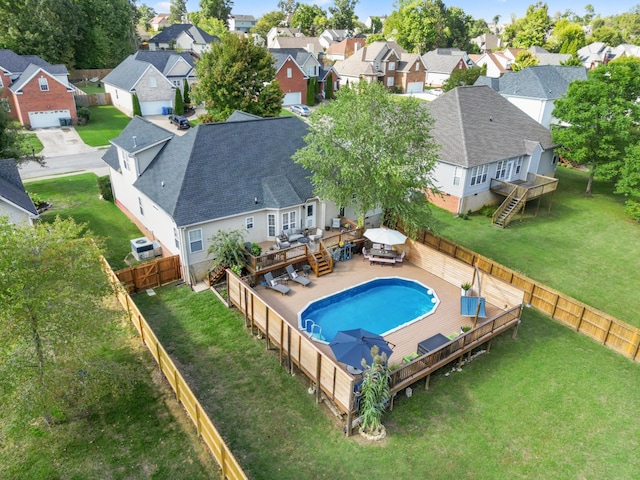 view of swimming pool featuring a deck