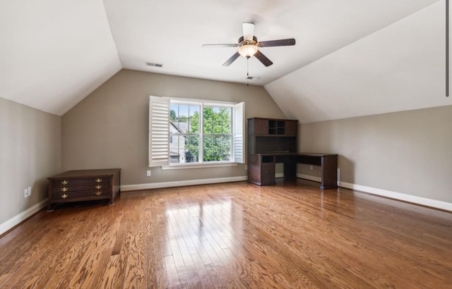 bonus room featuring ceiling fan, hardwood / wood-style floors, and lofted ceiling