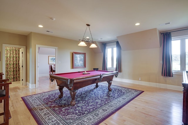 recreation room with light hardwood / wood-style floors, a healthy amount of sunlight, and pool table