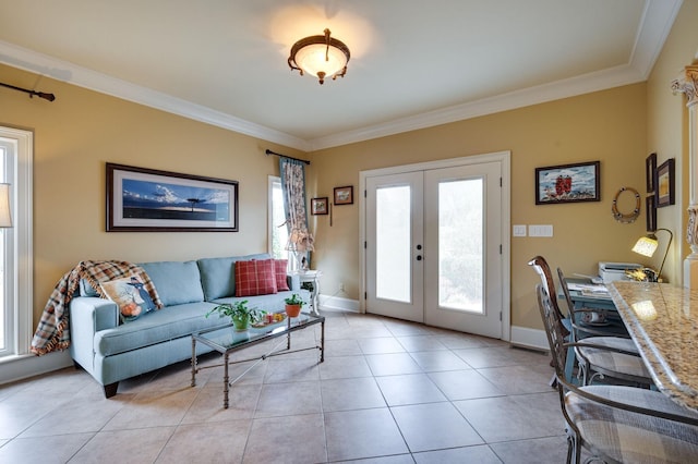 living room with french doors, light tile patterned floors, and crown molding