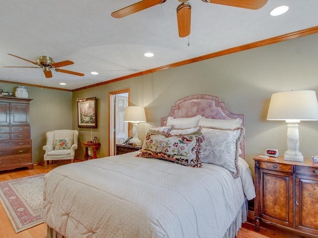 bedroom with crown molding, light hardwood / wood-style flooring, and ceiling fan