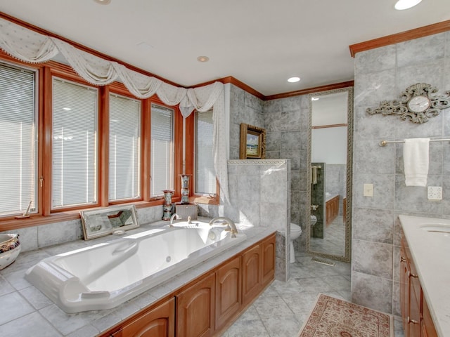 full bathroom with vanity, toilet, ornamental molding, and tile walls