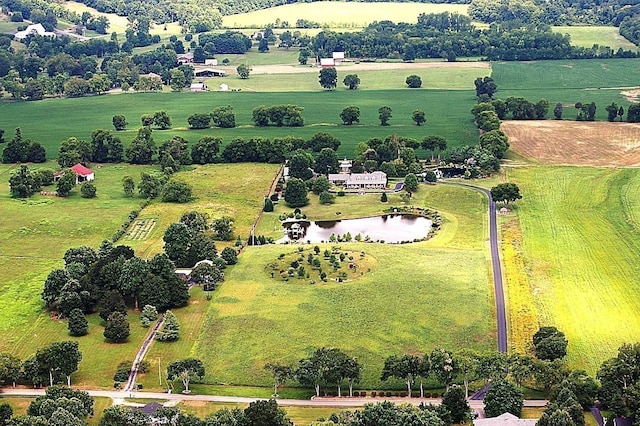 aerial view with a water view and a rural view