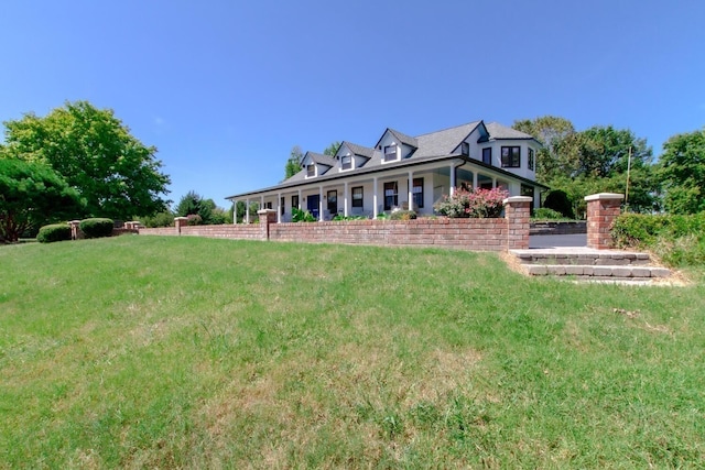 view of front of home with a front lawn