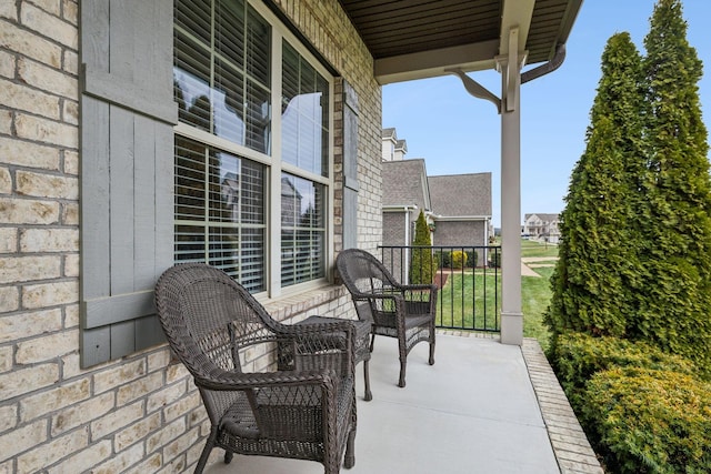 balcony featuring a porch