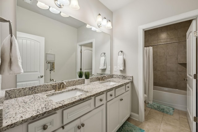 full bathroom with toilet, shower / bath combination with curtain, vanity, and tile patterned floors