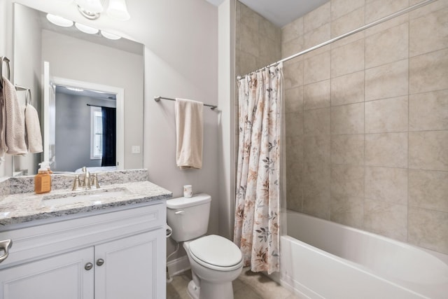 full bathroom featuring shower / bath combination with curtain, toilet, and vanity