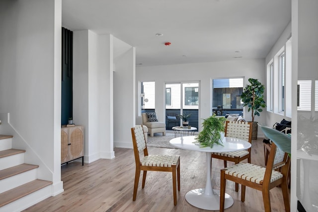 dining room with light wood-type flooring