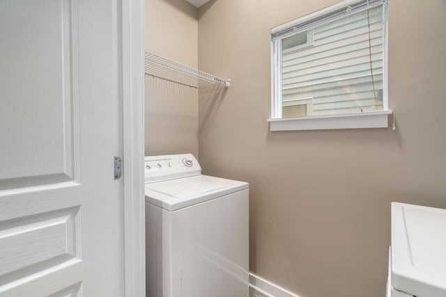 laundry room featuring washer / dryer