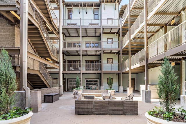 exterior space with outdoor lounge area and a patio