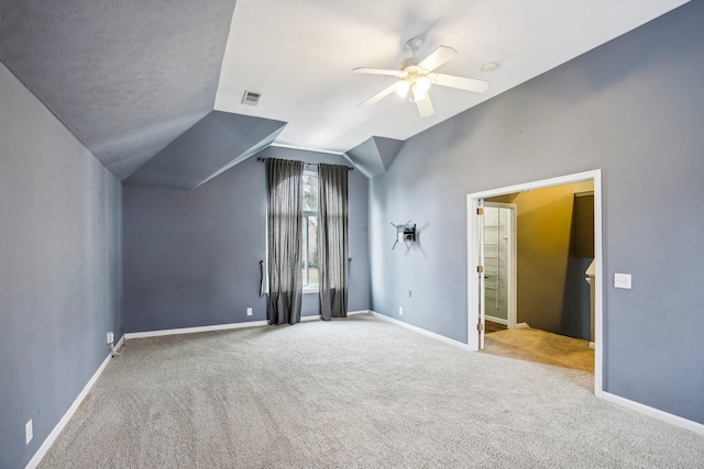 bonus room featuring carpet flooring, ceiling fan, and lofted ceiling