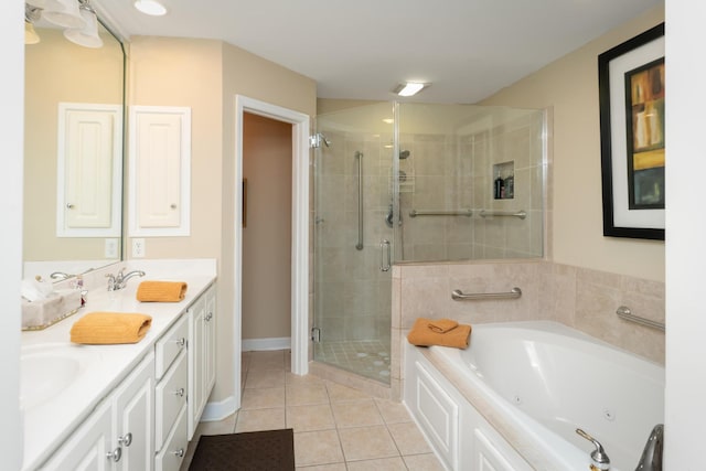 bathroom with tile patterned flooring, vanity, and separate shower and tub