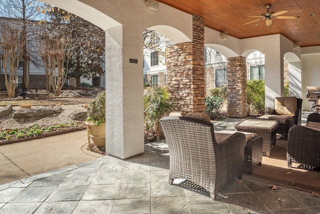 view of patio / terrace featuring ceiling fan