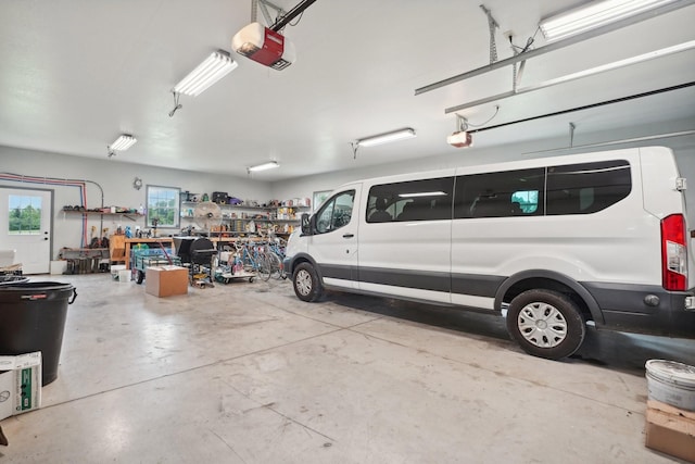 garage featuring a garage door opener