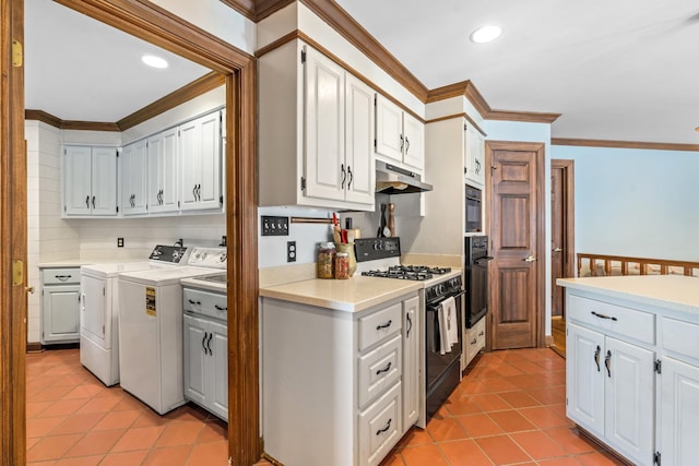 kitchen featuring white cabinetry, washer and clothes dryer, ornamental molding, and black appliances