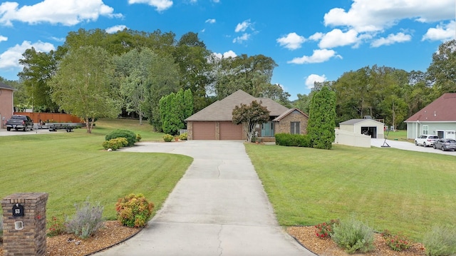 view of front of home featuring a garage and a front lawn