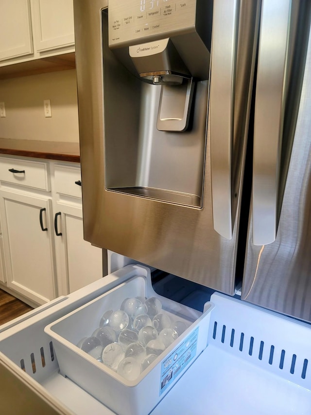 details featuring white cabinets