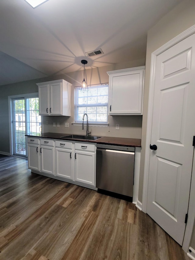 kitchen with dishwasher, white cabinets, dark hardwood / wood-style floors, and sink