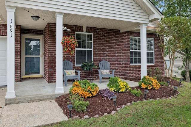 entrance to property with covered porch