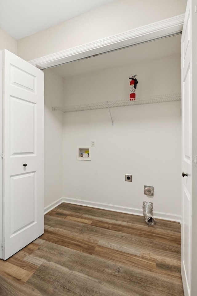 laundry room with electric dryer hookup, hookup for a washing machine, and hardwood / wood-style floors