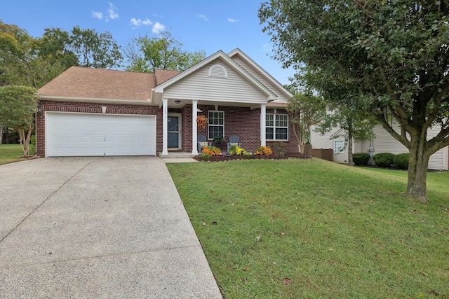 view of front of property with a porch, a garage, and a front yard