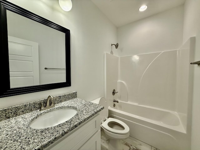 full bathroom featuring shower / bathing tub combination, vanity, and toilet