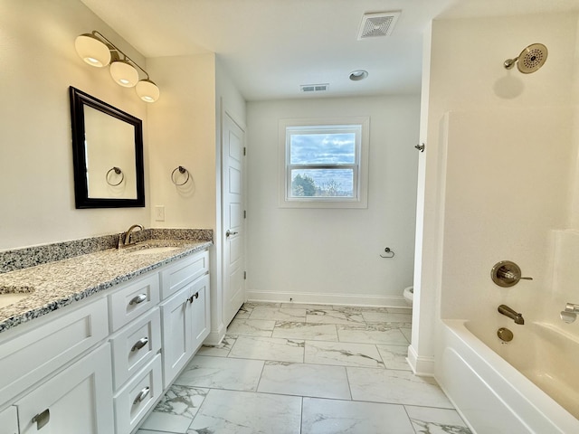 full bathroom featuring vanity, toilet, and shower / tub combination