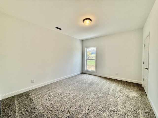 unfurnished room featuring carpet floors