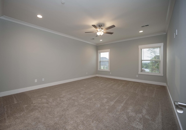 spare room featuring carpet flooring, ceiling fan, and ornamental molding