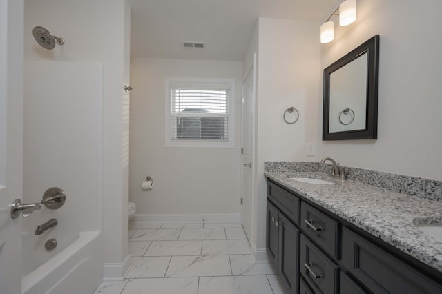 full bathroom featuring vanity,  shower combination, and toilet