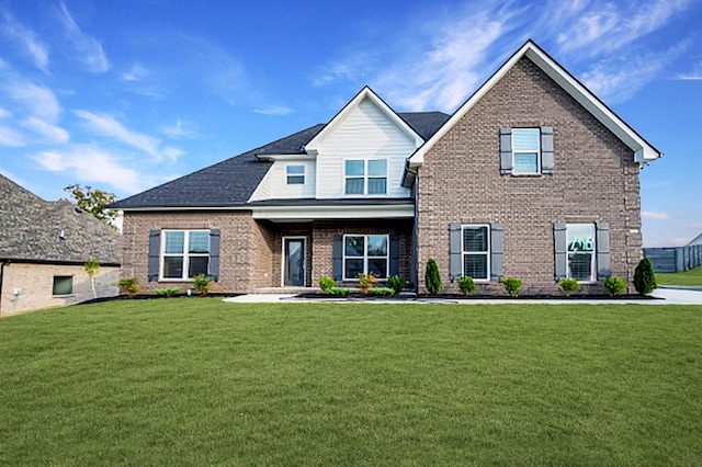 view of front of home with a front yard